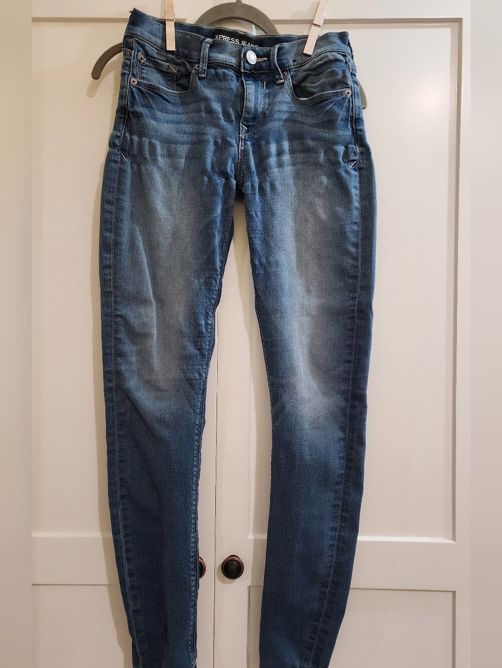 Express Women's Skinny Jeans in Faded Blue Wash